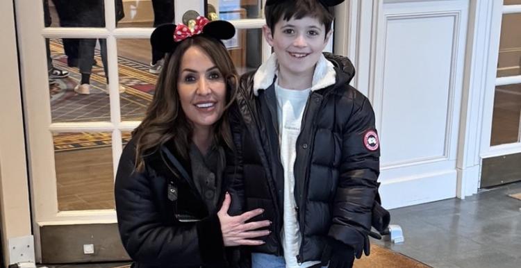 mum_crounching_down_with_her_young_son_standing_by_her_side