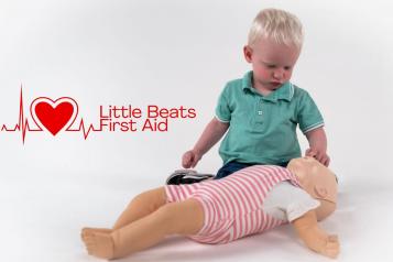 little_boy_learning_first_aid