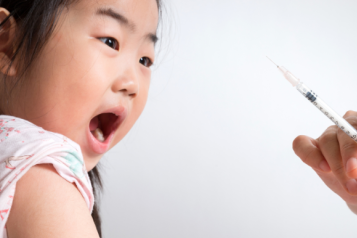 oriental_young_girl_screaming_at_the_sight_of_needle