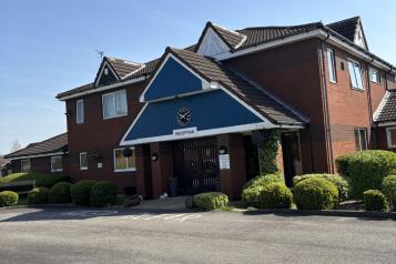 Photograph of the outside of Mapleton Court
