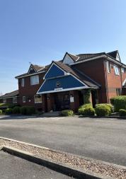 Photograph of the outside of Mapleton Court